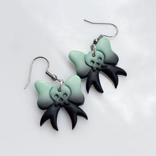 PISTACHIO SKULL BOW EARRINGS