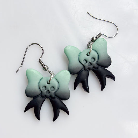 PISTACHIO SKULL BOW EARRINGS