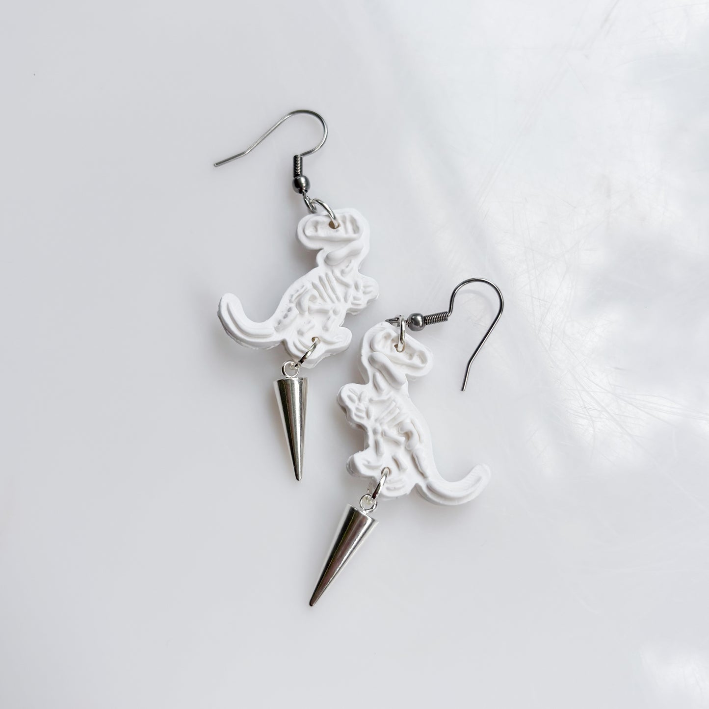 T-REX SKELETON EARRINGS