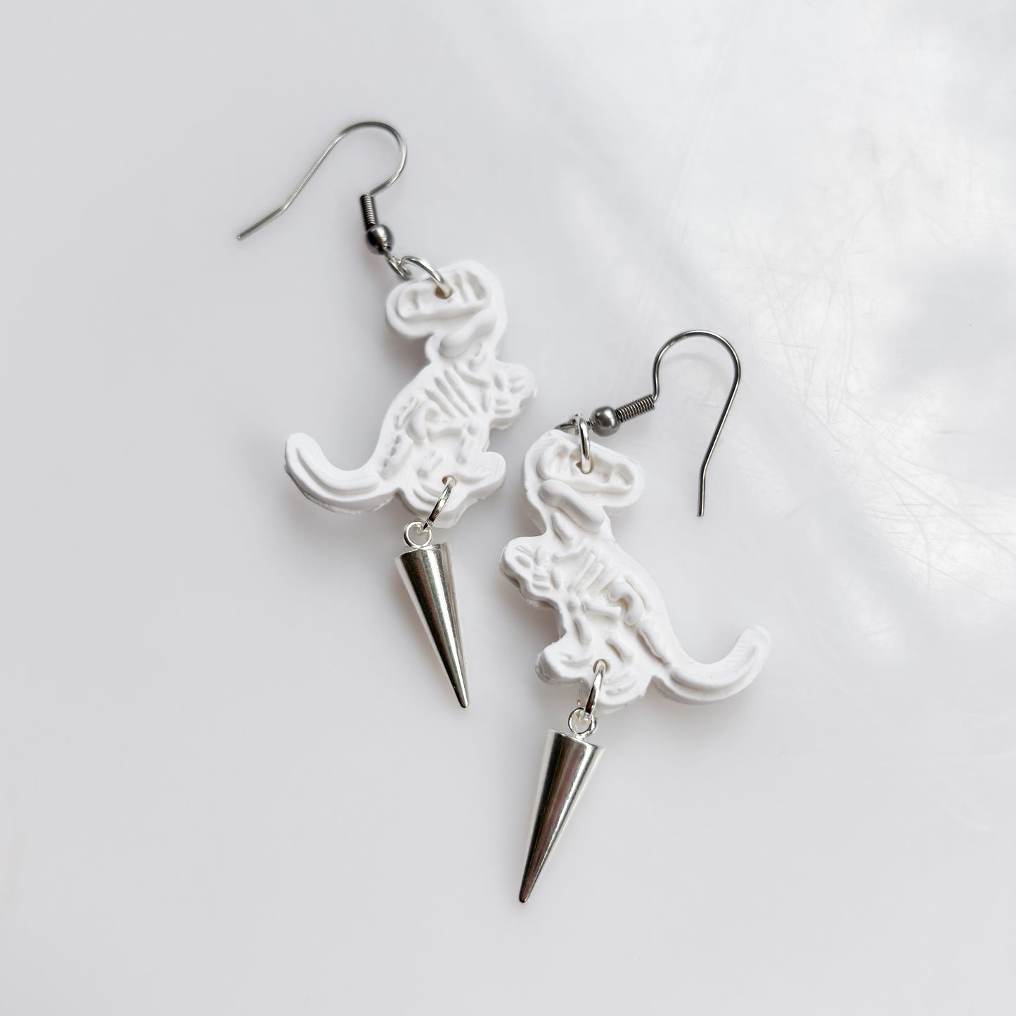 T-REX SKELETON EARRINGS