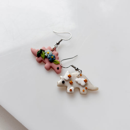 PINK STEGOSAURUS & PEARLY TRICERATOPS MISMATCHED EARRINGS