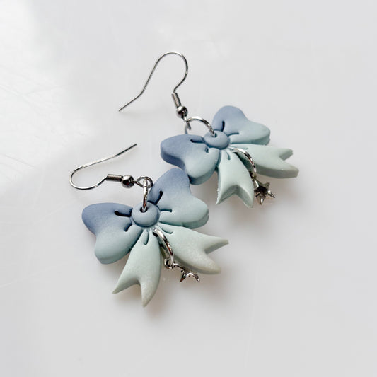 BLUE BOW SILVER STAR EARRINGS