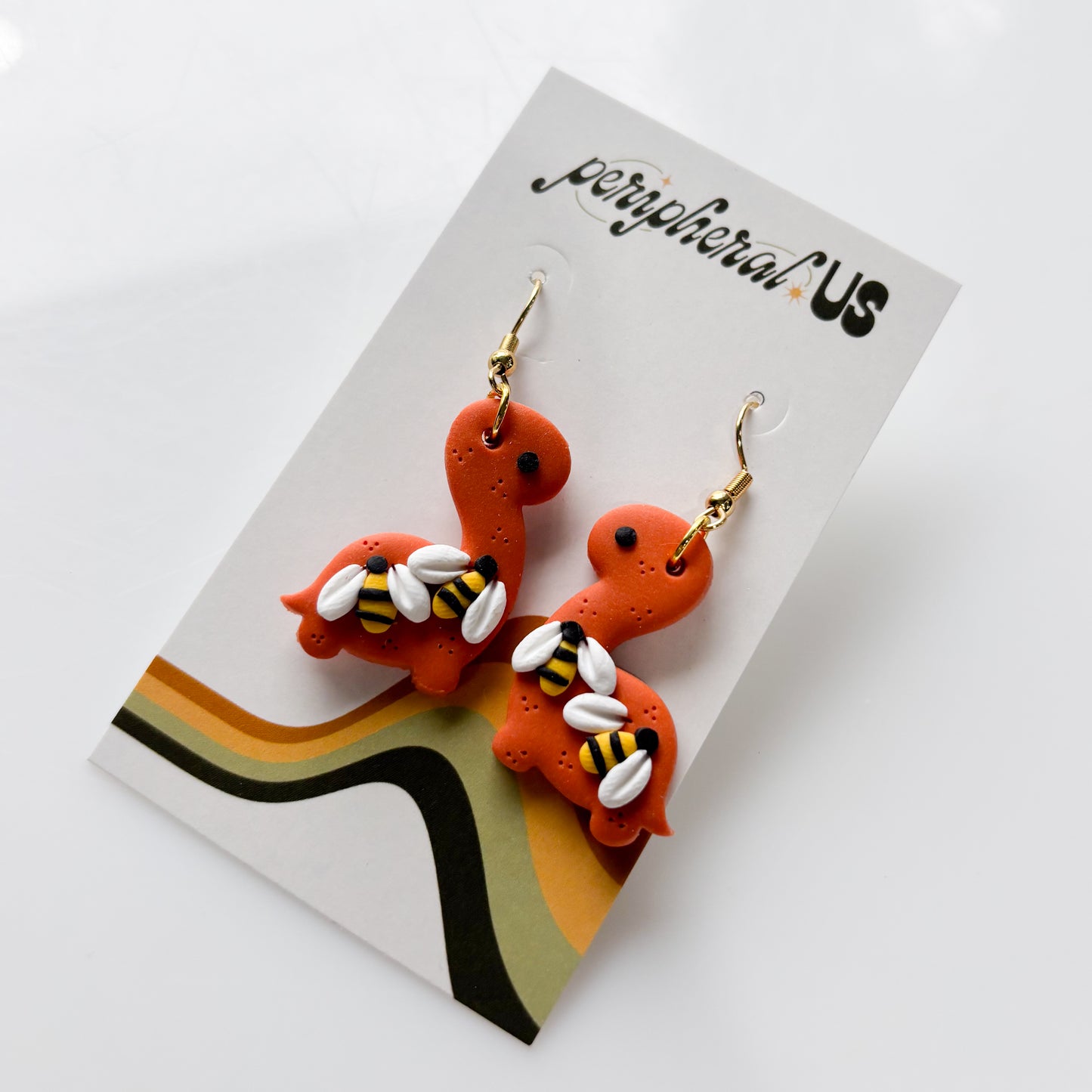 ORANGE BEE BRONTO DINO EARRINGS
