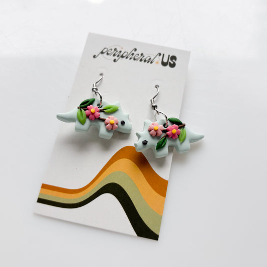 PALE BLUE CHERRY BLOSSOM TRICERATOPS DINO EARRINGS