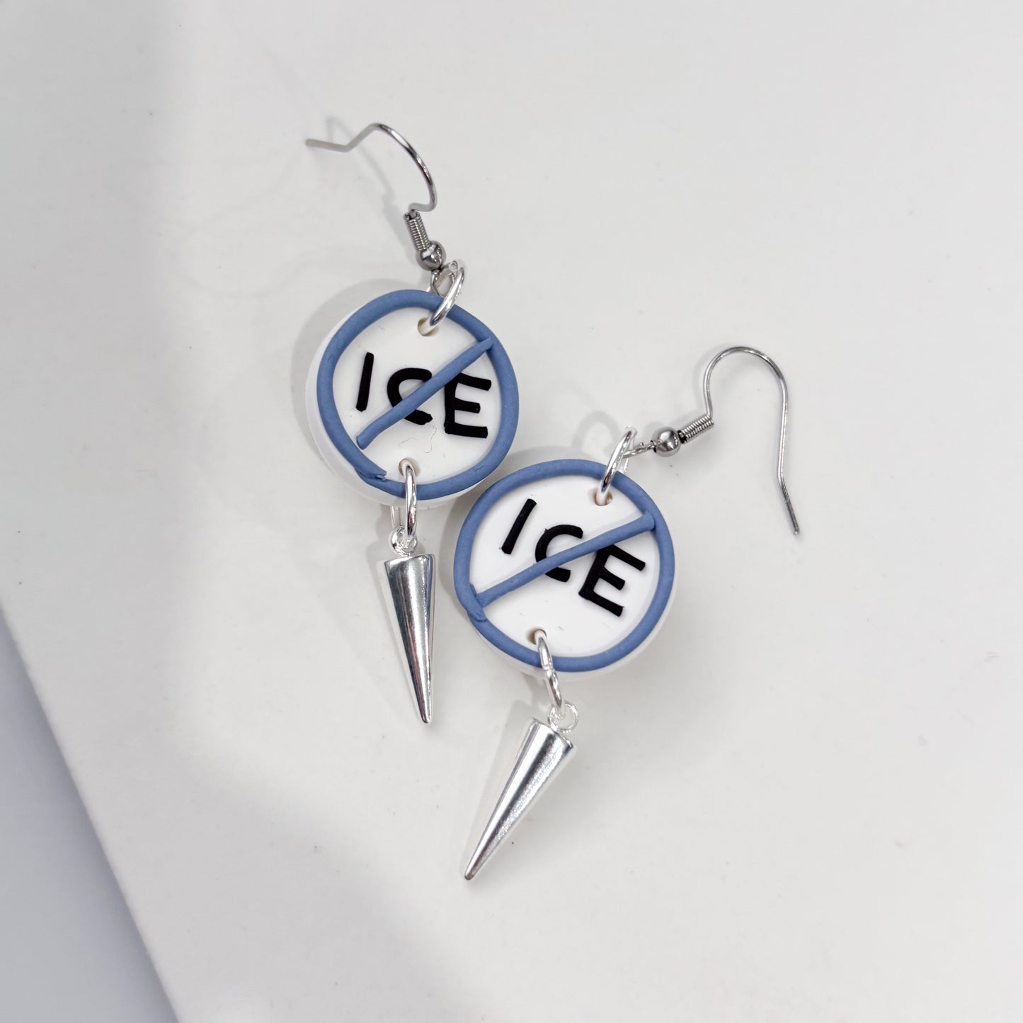 ICE OUT BLUE CIRCLE EARRINGS