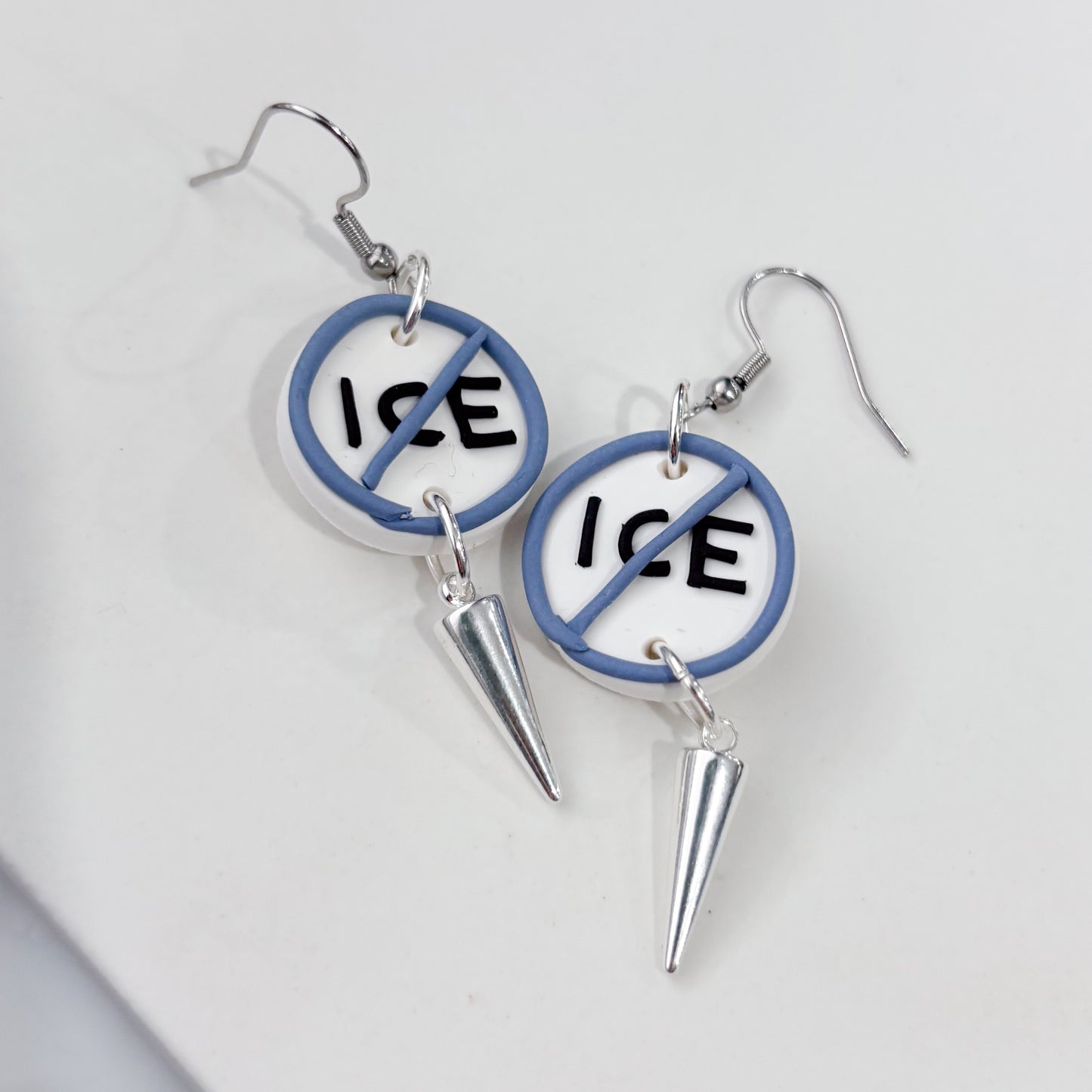 ICE OUT BLUE CIRCLE EARRINGS