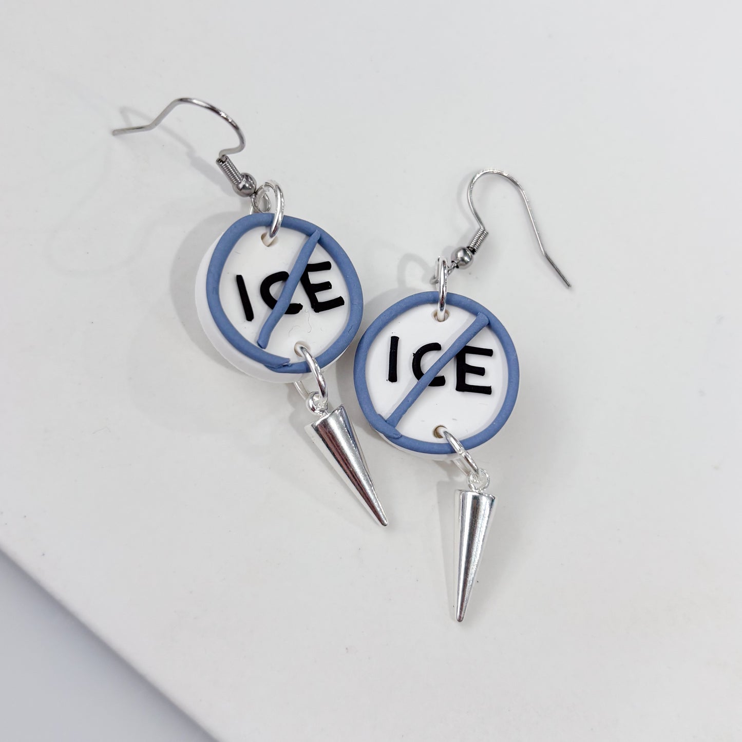 ICE OUT BLUE CIRCLE EARRINGS