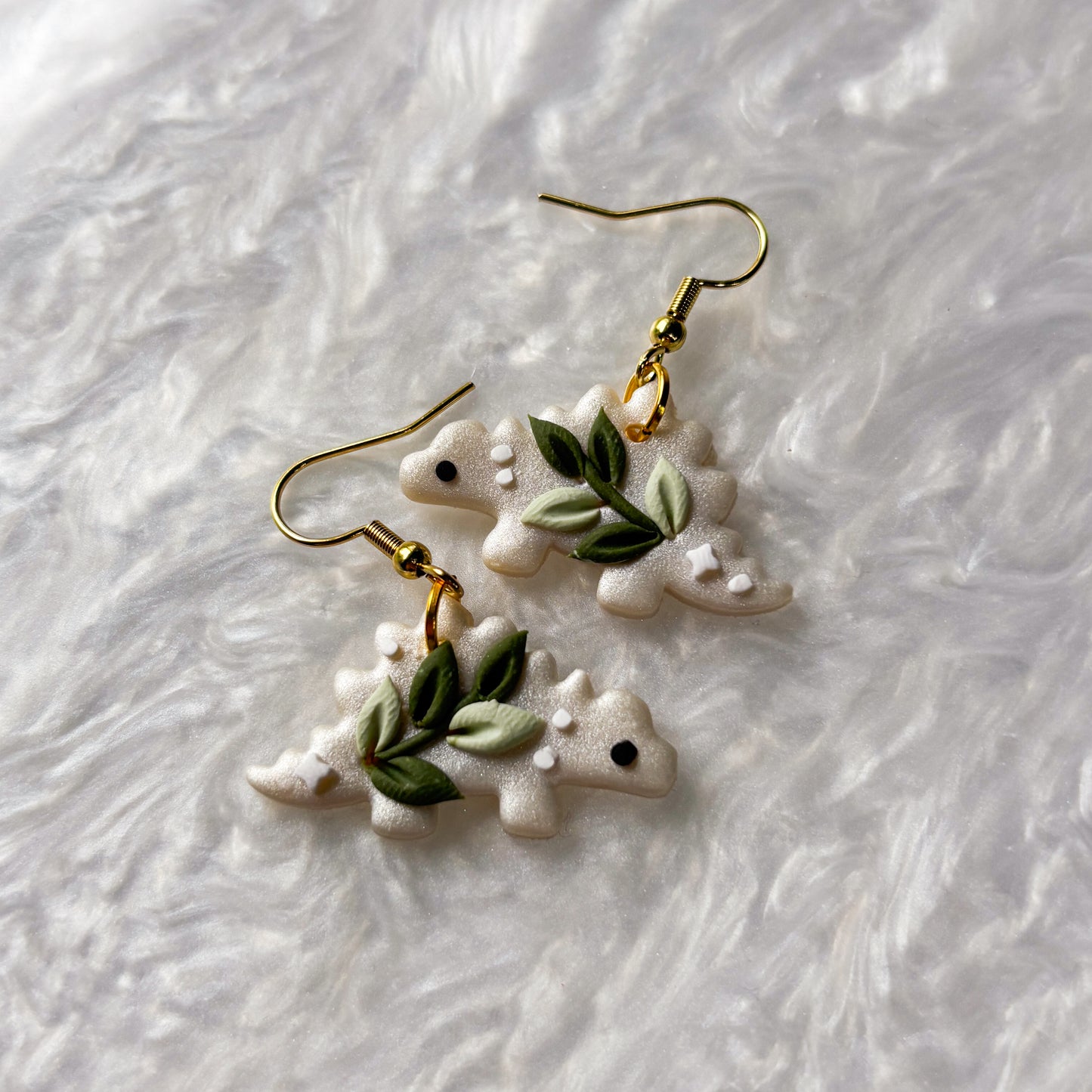 CELESTIAL VINE DINO EARRINGS (STEGOSAURUS)