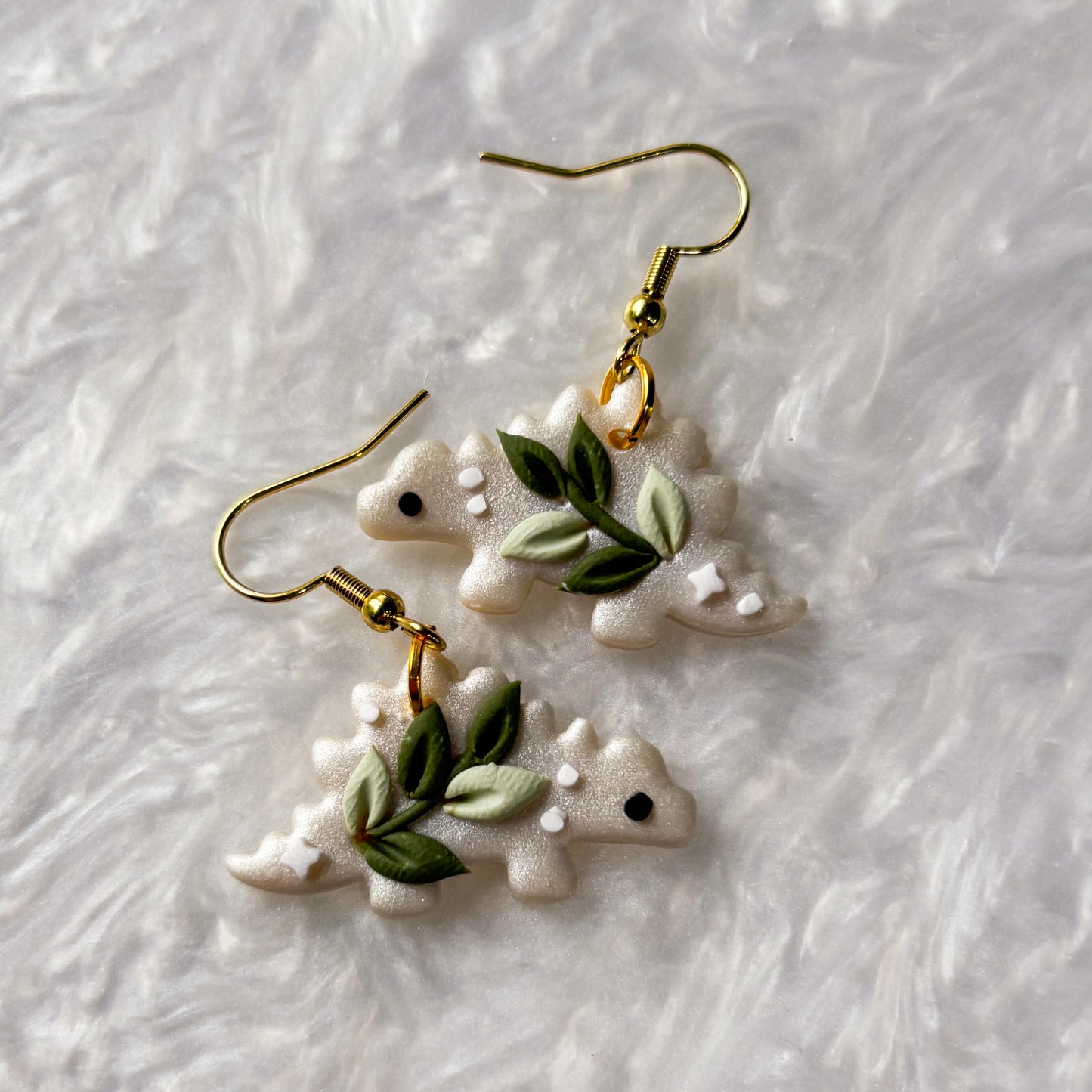 CELESTIAL VINE DINO EARRINGS (STEGOSAURUS)