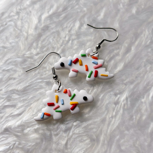 RAINBOW SPRINKLE DINO EARRINGS (STEGOSAURUS)