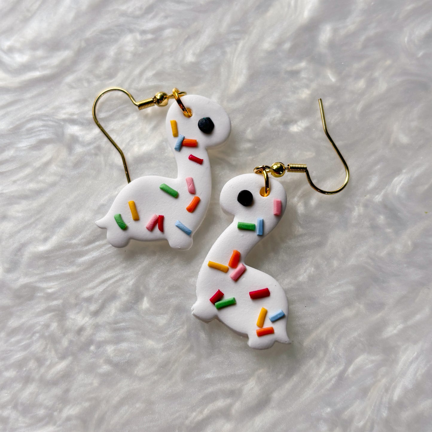RAINBOW SPRINKLE DINO EARRINGS (BRONTO)