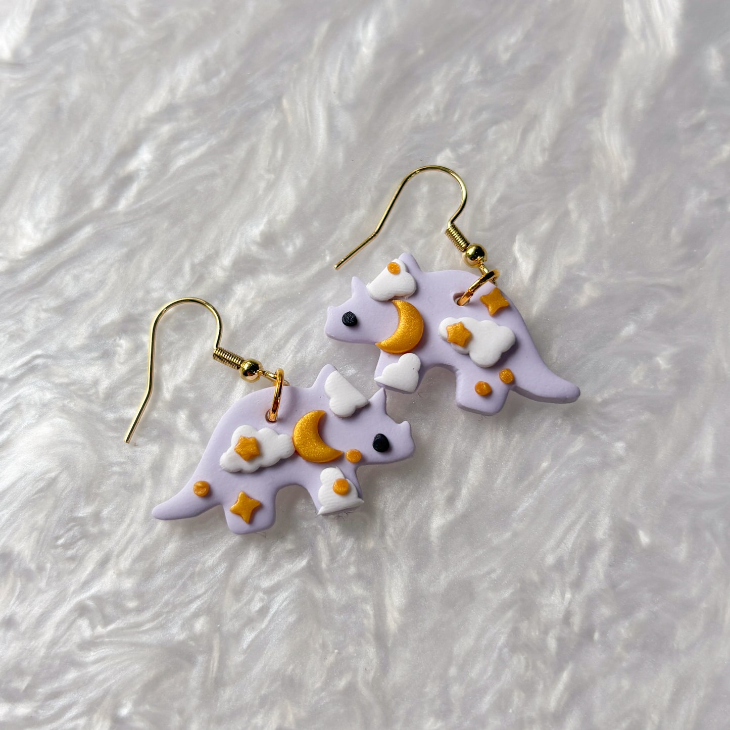 PURPLE CELESTIAL DINO EARRINGS (TRICERATOPS)