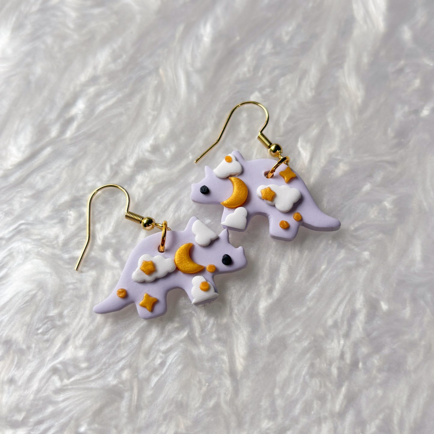 PURPLE CELESTIAL DINO EARRINGS (TRICERATOPS)