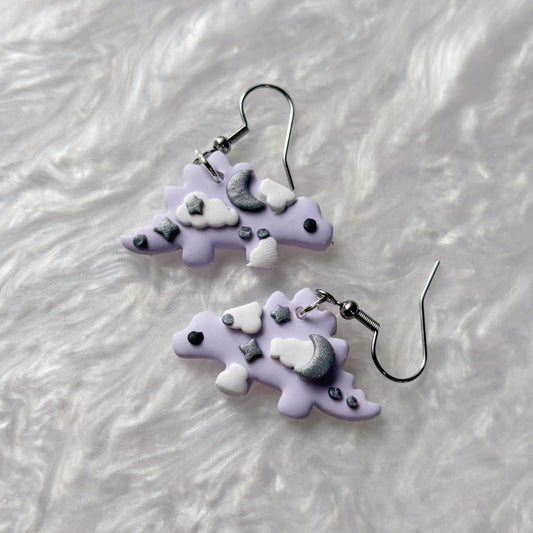 PURPLE CELESTIAL DINO EARRINGS (STEGOSAURUS)