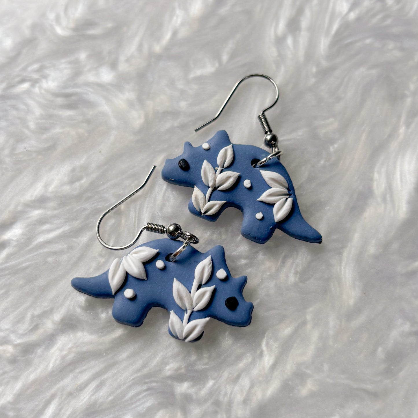 PORCELAIN BLUE DINO EARRINGS (TRICERATOPS)