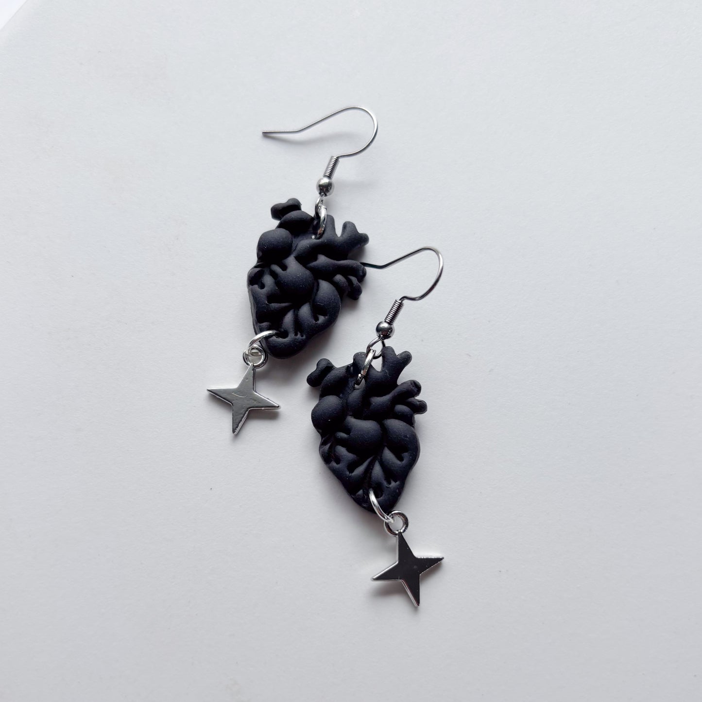 BLACK ANATOMICAL HEART EARRINGS