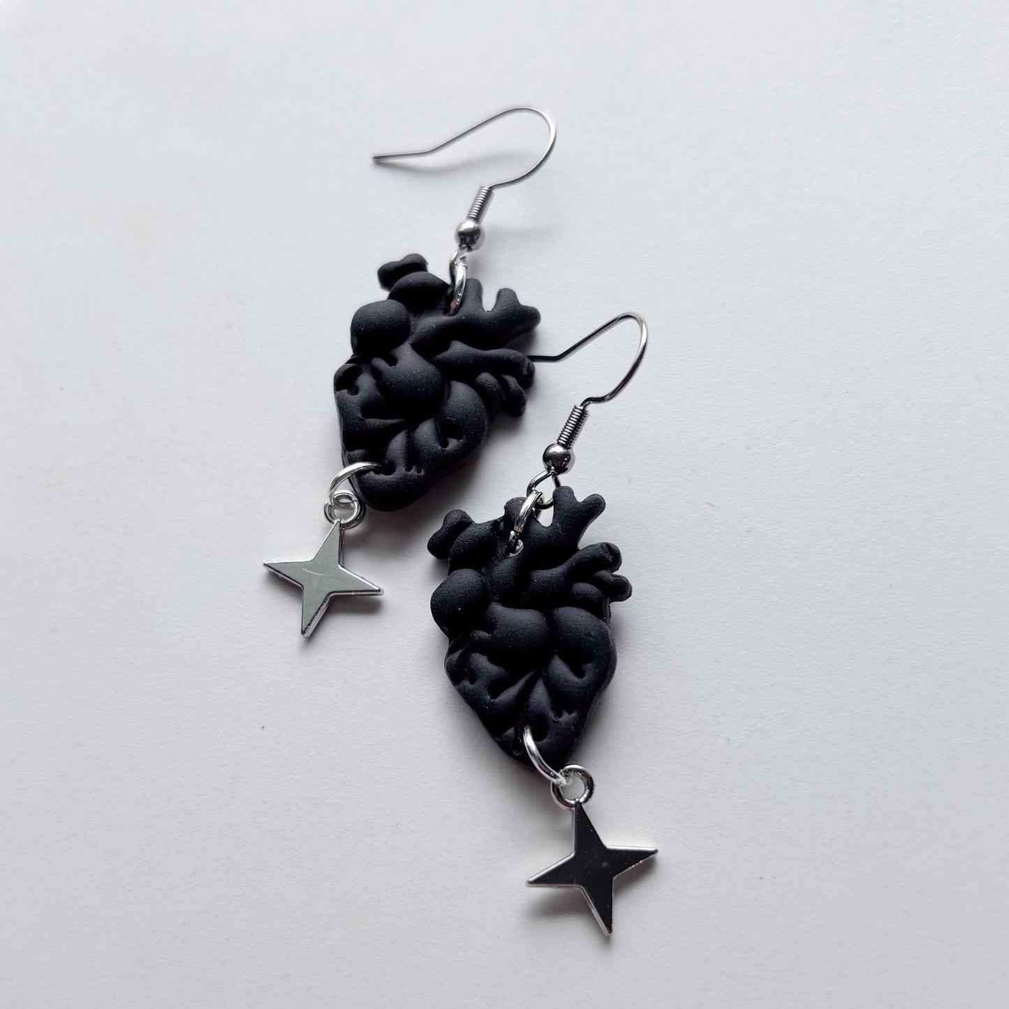 BLACK ANATOMICAL HEART EARRINGS