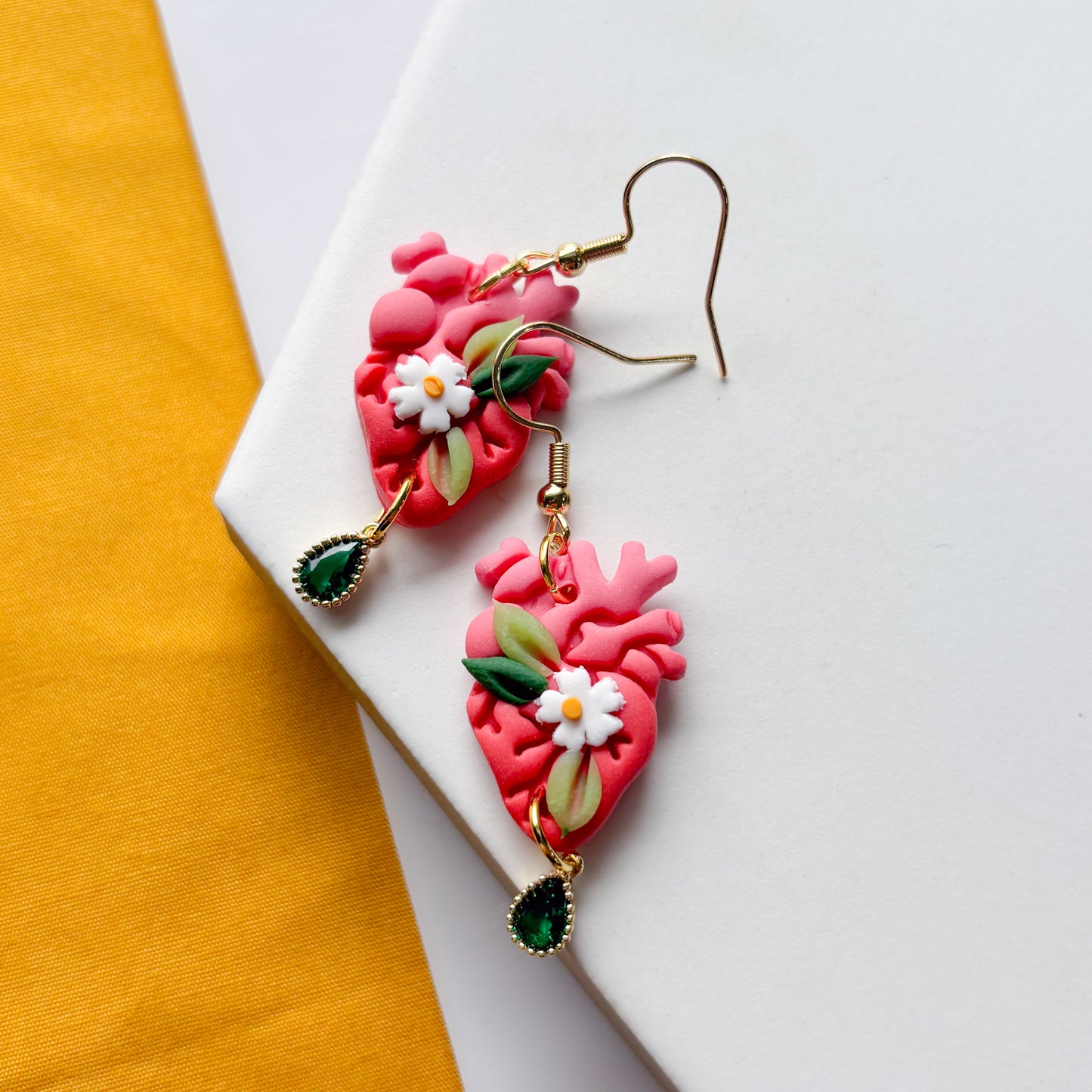 PINK DAISY ANATOMICAL HEART EARRINGS