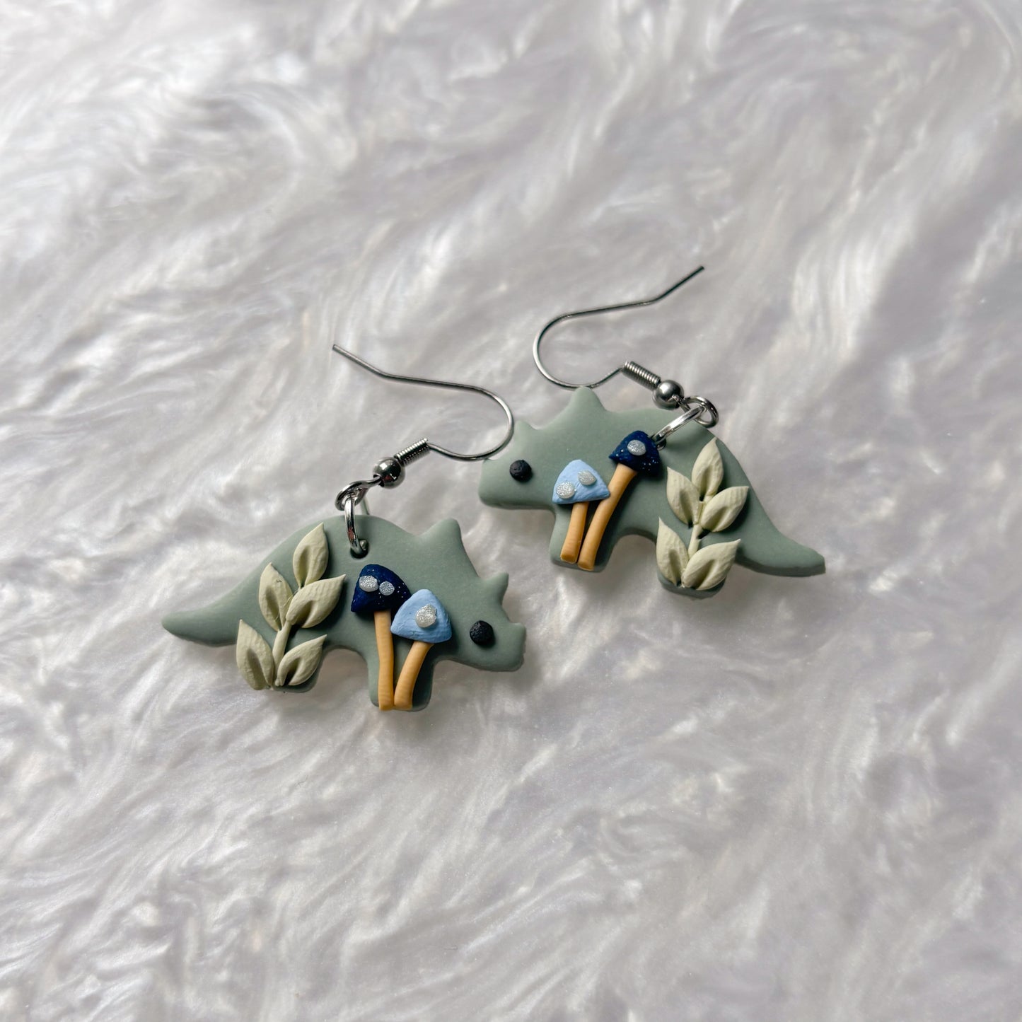 BLUE MUSHROOM DINO EARRINGS (TRICERATOPS)