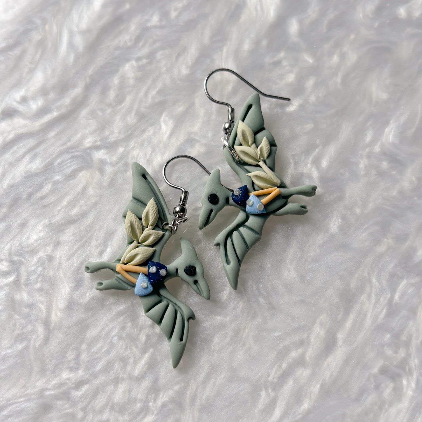 BLUE MUSHROOM DINO EARRINGS (PTERODACTYL)