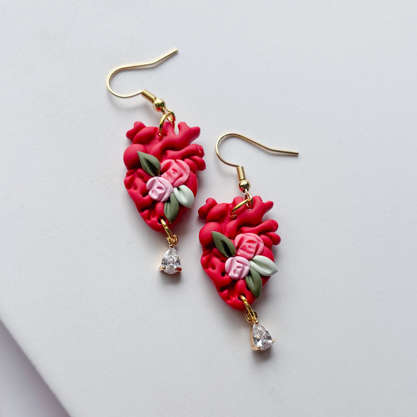 RED FLORAL ANATOMICAL HEART EARRINGS