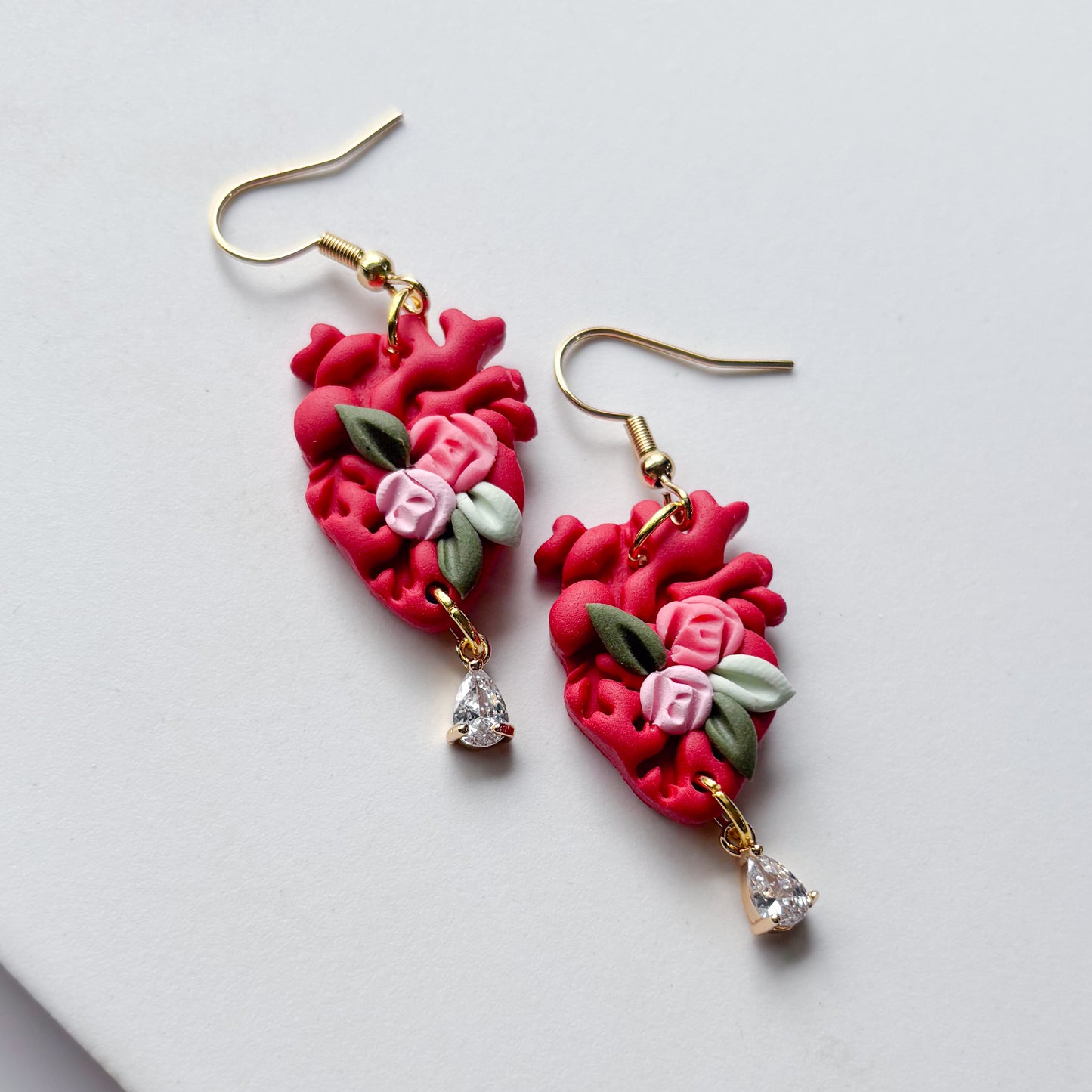 RED FLORAL ANATOMICAL HEART EARRINGS