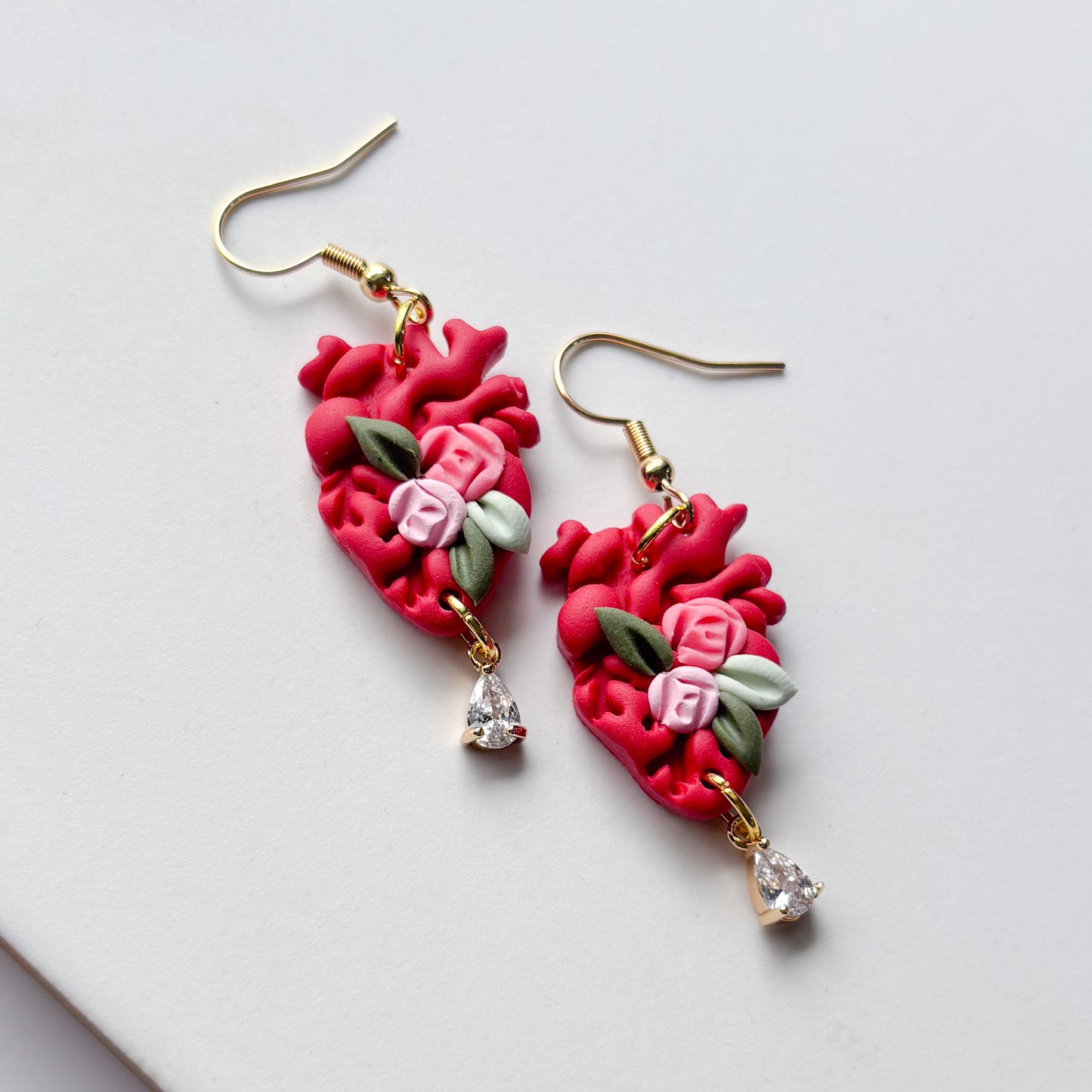 RED FLORAL ANATOMICAL HEART EARRINGS