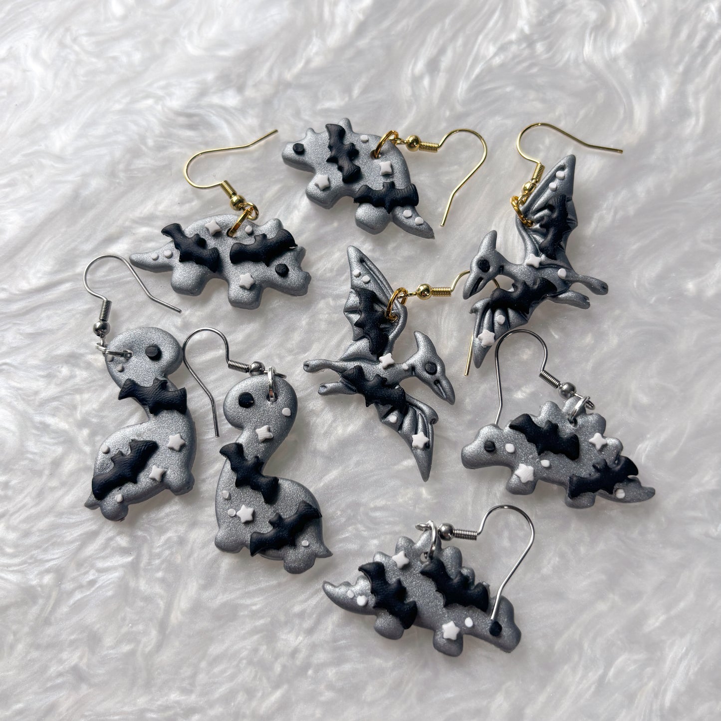 BAT DINO EARRINGS (STEGOSAURUS)