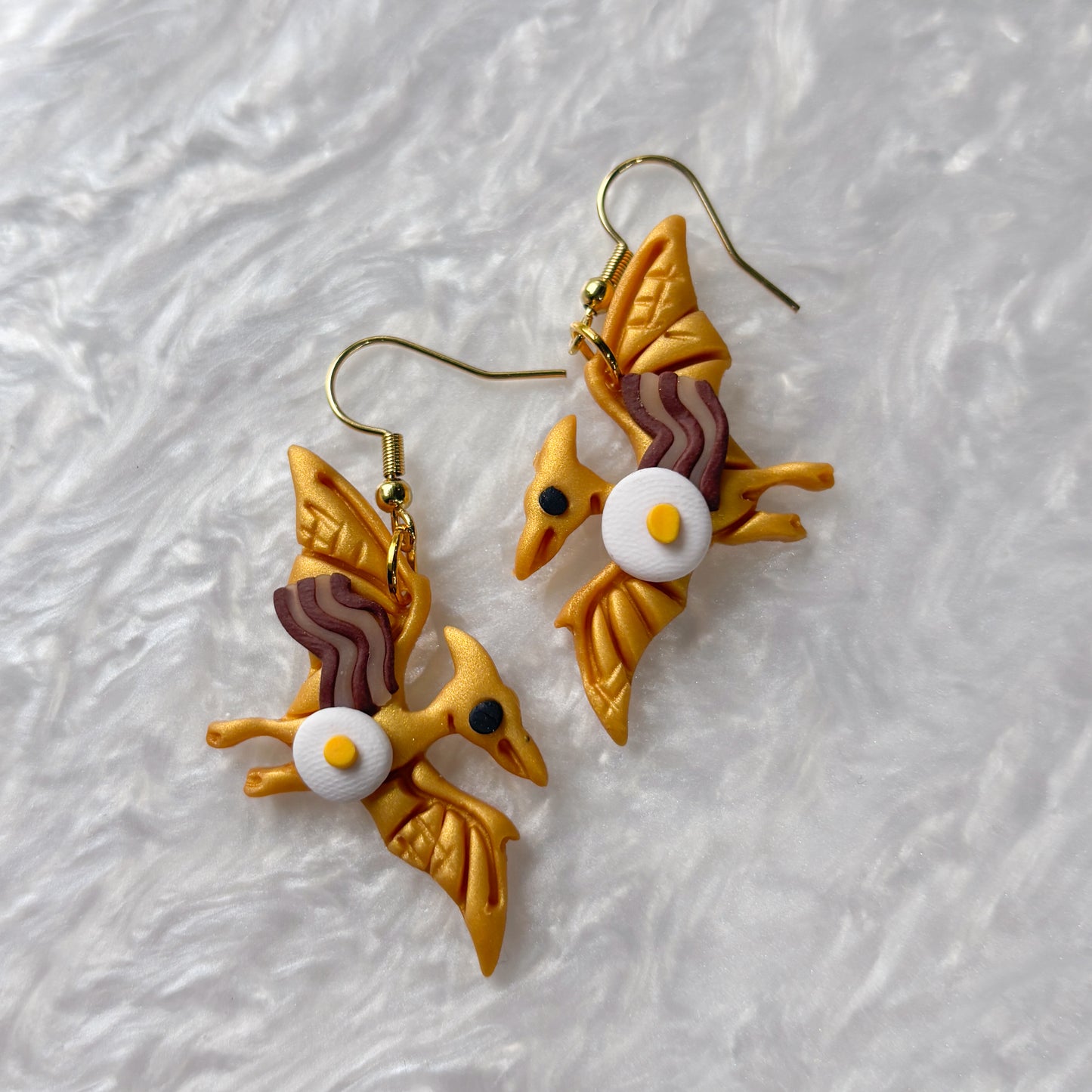 BREAKFAST DINO EARRINGS (PTERODACTYL)