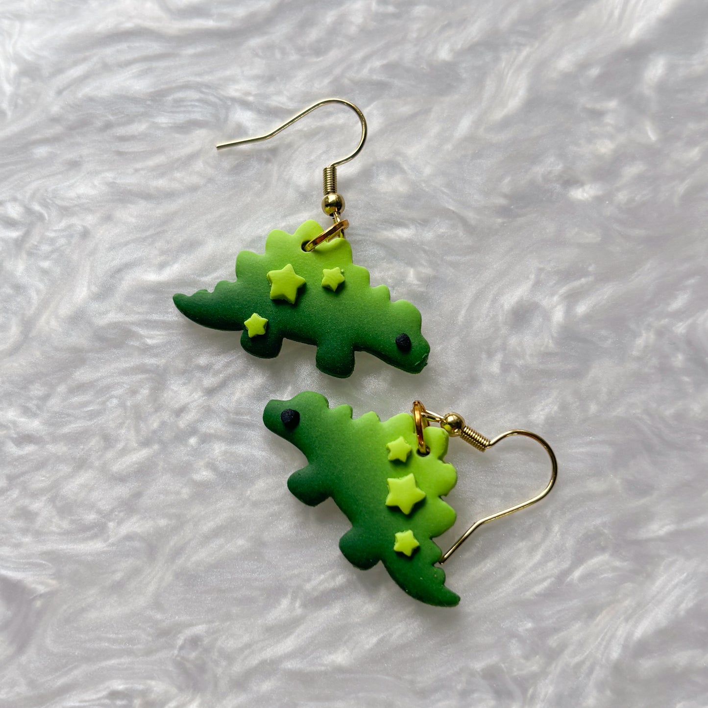GRADIENT GREEN WITH STARS DINO EARRINGS (STEGOSAURUS)